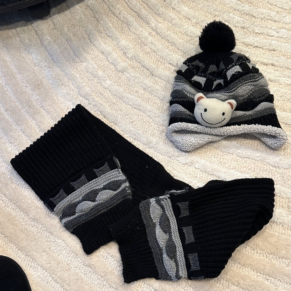 Charming Kids' Black and Gray Pom-Pom Hat with matching scarf